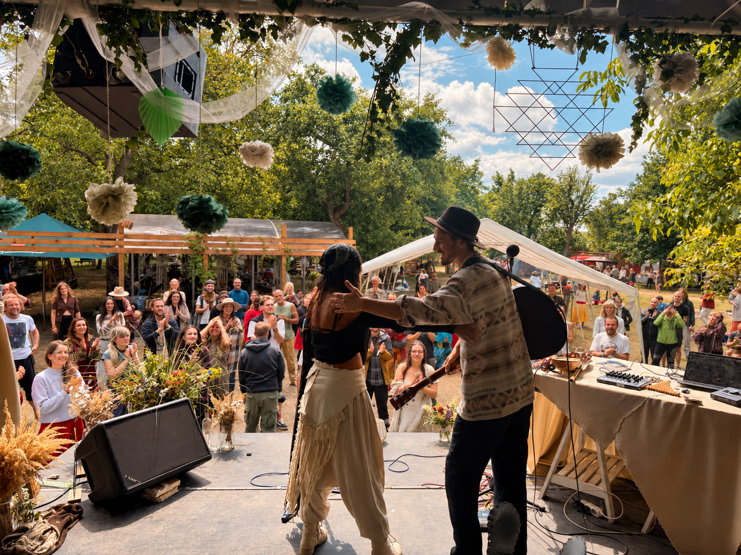 Chika Toro performing with a musician on an outdoor stage